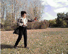 [Image: Sprinkling tobacco on the ground, in a ceremony. This picture links to 'peacepipe.html' file, just like the picture to the left. The point of this file on Native American tobacco practices, is that ritual use of a psychoactive is better management than the casual smoking widely practiced by the average tobacco consumer.]